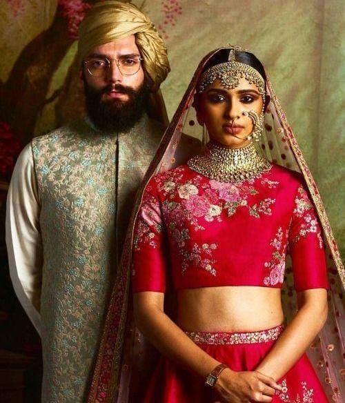 This Red Sabyasachi Lehenga Is The Latest Fad Among Brides & We're Loving  It | WeddingBazaar